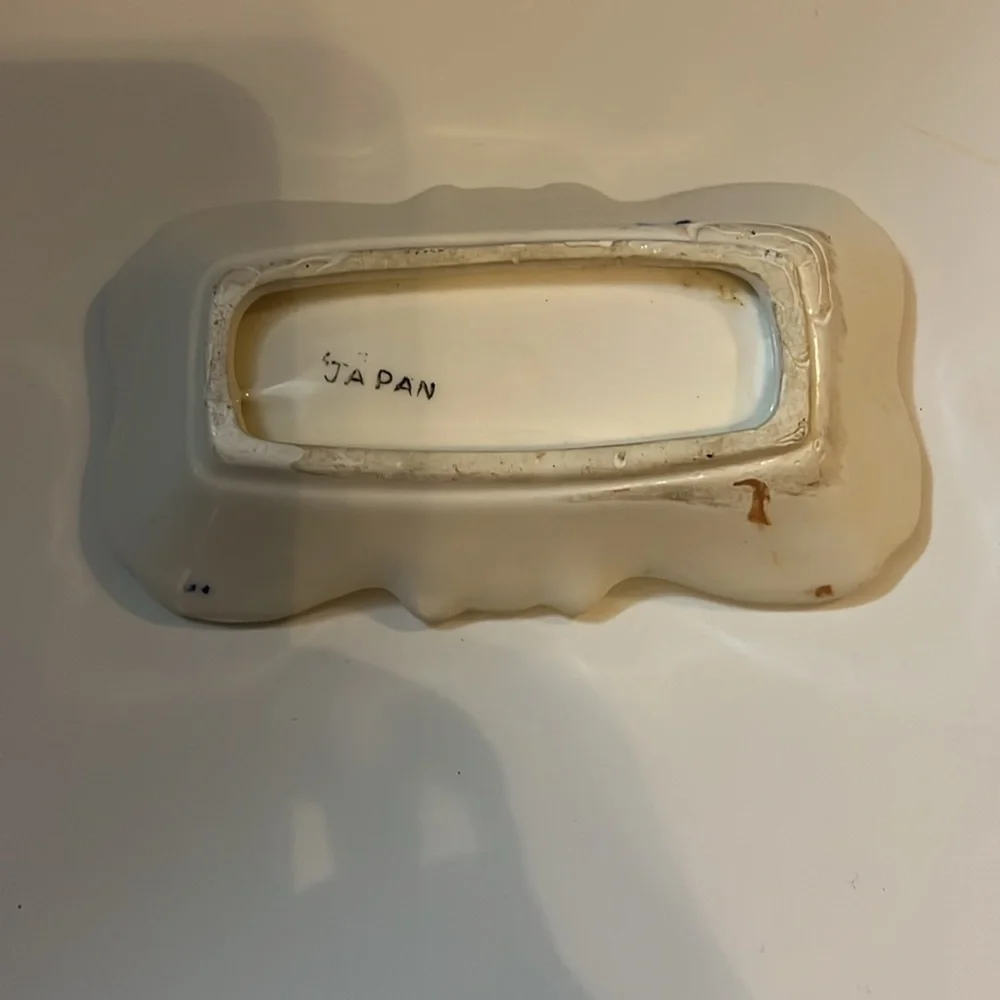 Nut dish by Royal Grace. Blue and Gold trim. 4.5” x 2.5” no chips or cracks